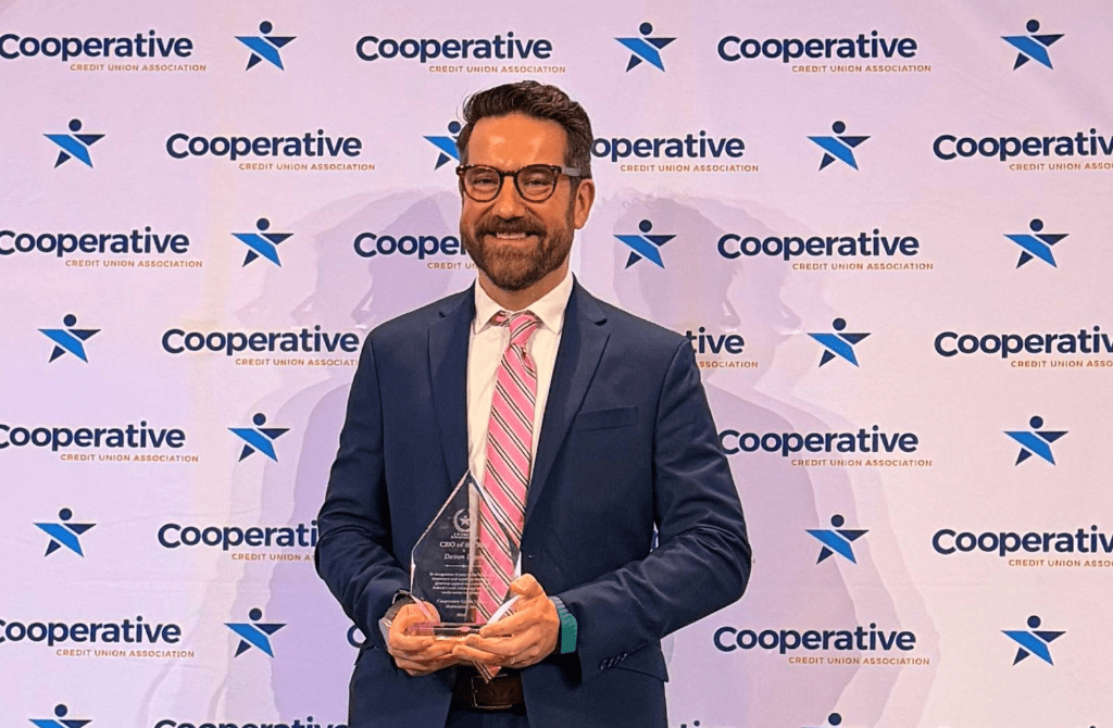 Central One Federal Credit Union President and CEO Devon Lyon receives CEO of the year award from CCUA